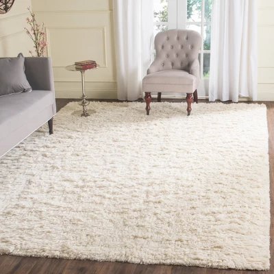 Ivory Solid Knotted Area Rug - (6'x9') - Safavieh 1 Ivory Solid Knotted Area Rug - (6'x9') - Safavieh